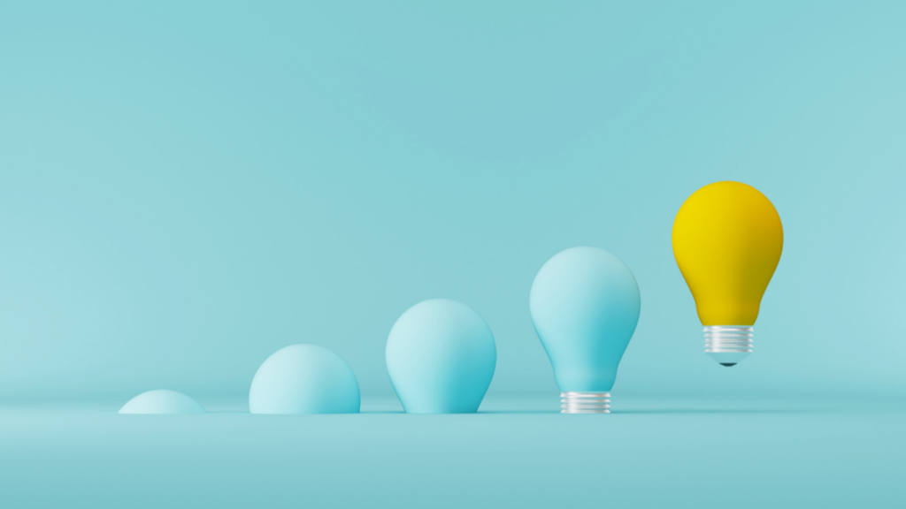 yellow lightbulb stands out from the other mint coloured lightbulbs for SEO dos and don'ts blog post